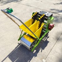 手推式電動三行大蒜播種機(jī) 四輪帶株距可調(diào)種蒜機(jī) 農(nóng)用蒜瓣種植機(jī)